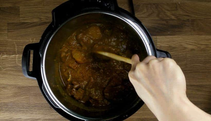 Pressure Cooker Curry Goat Recipe (Instant Pot Goat Curry): break up potatoes, thicken Indian Curry sauce, stir in chopped cilantro in Instant Pot Electric Pressure Cooker
