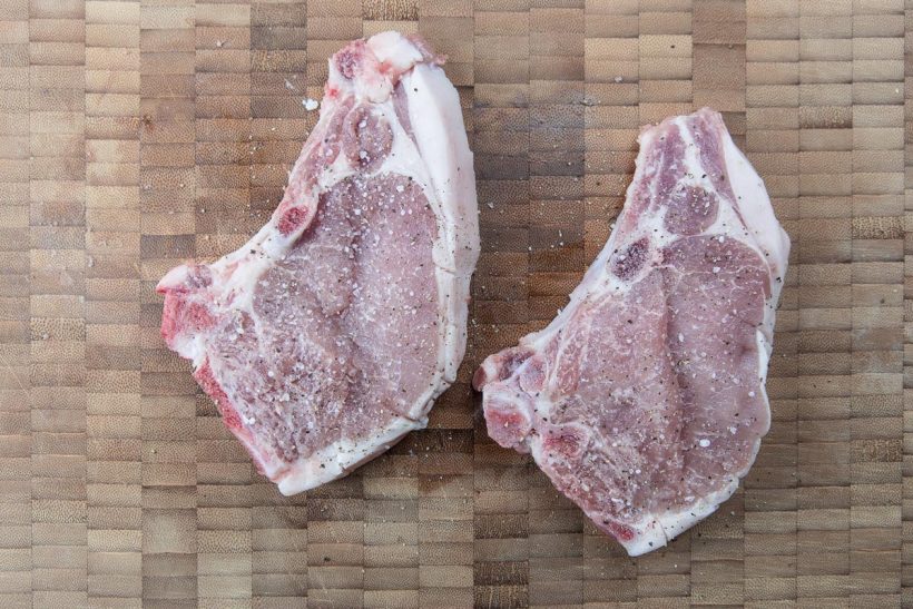 Pressure Cooker Pork Chops and Applesauce Recipe, season generously with Kosher salt and grounded black pepper