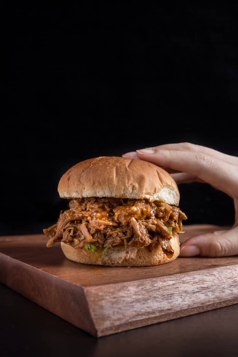 Make this irresistible Pressure Cooker Pulled Pork Recipe (Instant Pot Pulled Pork). Quick & easy way to make tender, juicy BBQ pulled pork packed with sweet & smoky flavors.