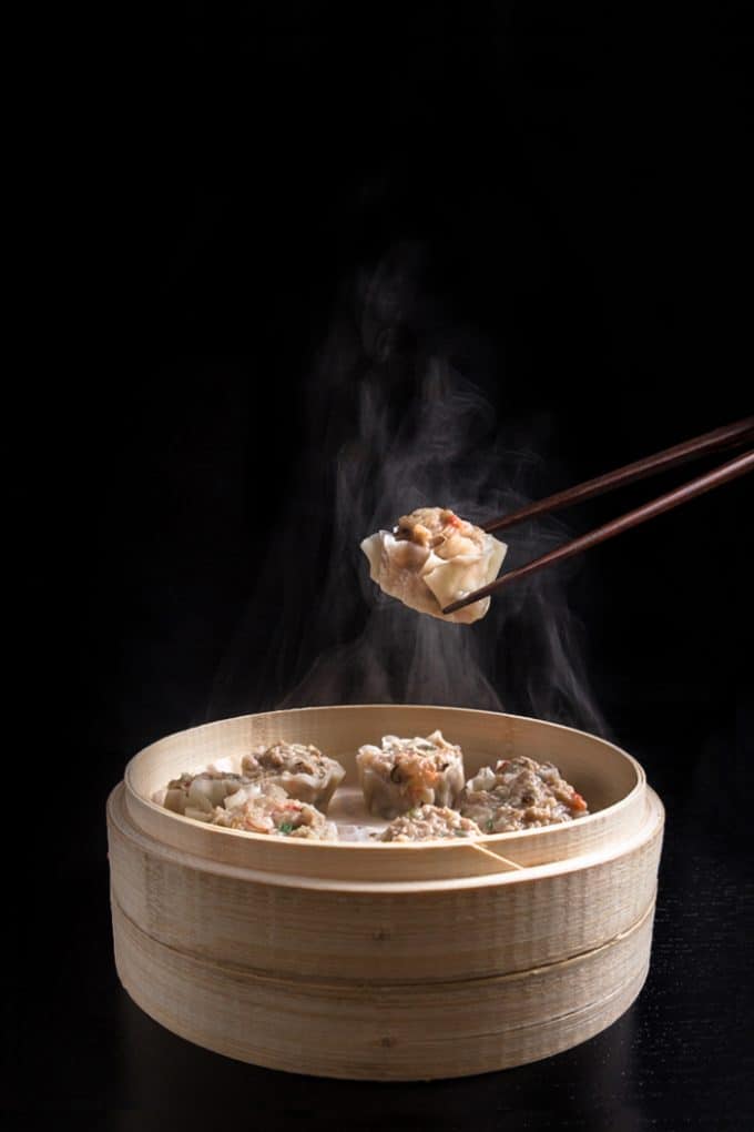 Make this Chinese dim sum Shumai Recipe (燒賣, Siu Mai, Shaomai, or Siomai). Flavorful Pork Dumplings with crunchy shrimps, bouncy pork & fragrant mushrooms. Great make ahead freezer meals!
