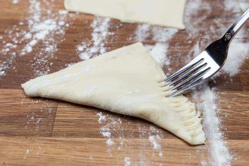 Easy Apple Turnovers - sealing the edges with a fork 