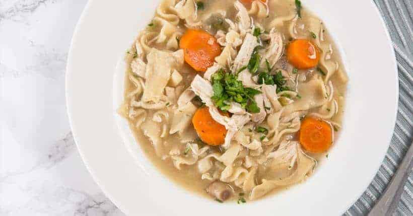 Pressure Cooker Chicken Noodle Soup Recipe: Healthy, simple & soothing Chicken Noodle Soup made with real/whole food & no butter/sauces. Homey like a warm hug when you needed it the most.