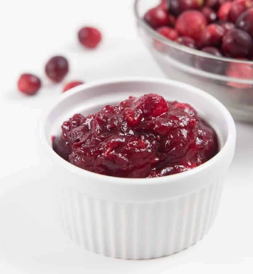 Easy Pressure Cooker Cranberry Sauce Recipe: Tangy & sweet fresh homemade cranberry sauce is great as a jam-like spread, topping for desserts, filling for pastries, glaze for meat, or extra flavor for yogurt/smoothie. Don't just save it for Thanksgiving dinner!