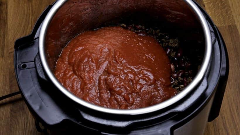 do not mix the tomato paste to avoid scorching