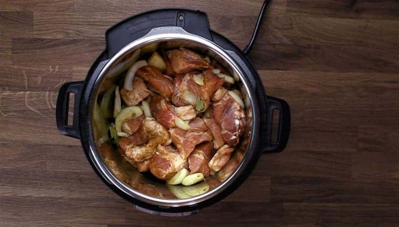 Easy Instant Pot Carnitas Recipe (Pressure Cooker Carnitas): Marinating pork shoulder (pork Boston butt meat)