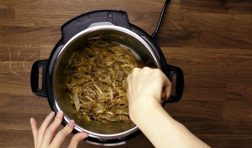 Instant Pot Pulled Pork Recipe (Easy Pressure Cooker Pulled Pork): add pulled pork into maple dijon sauce
