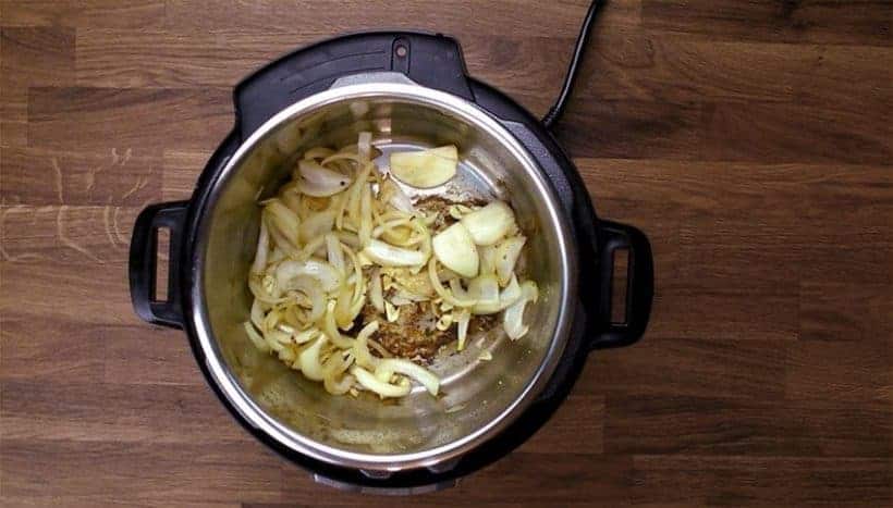 Instant Pot Pulled Pork Recipe (Easy Pressure Cooker Pulled Pork): saute onions and garlic