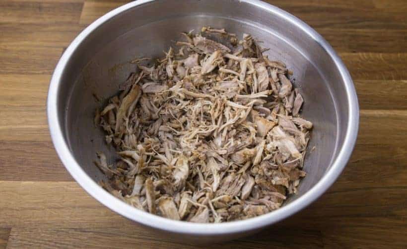 Instant Pot Pulled Pork Recipe (Easy Pressure Cooker Pulled Pork): shred pork shoulder meat (Boston butt) with forks