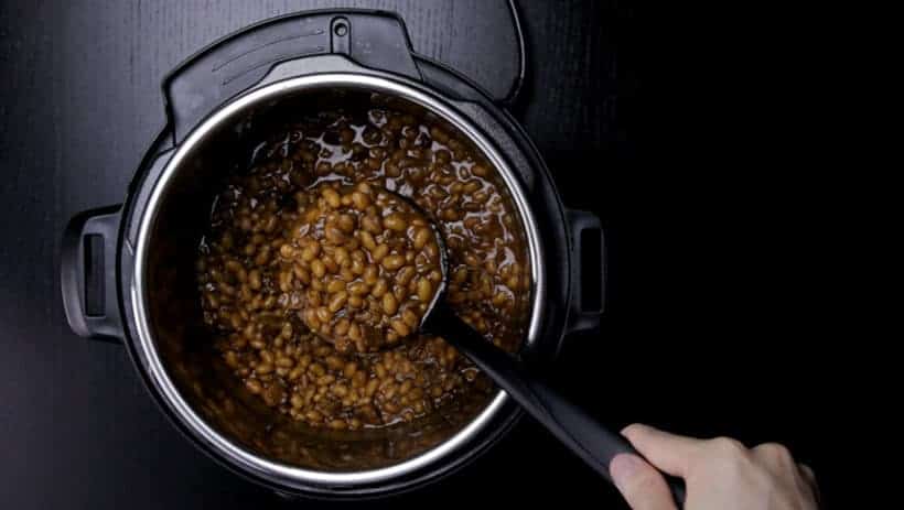 Make Smokey Instant Pot Baked Beans Recipe (Pressure Cooker Baked Beans): thicken Boston baked beans to create sweet and smokey sticky sauce