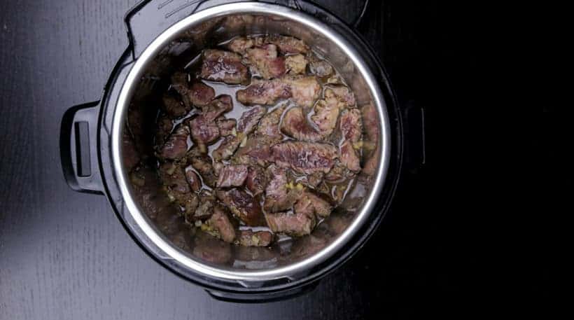 Instant Pot Beef and Broccoli Recipe (Pressure Cooker Beef and Broccoli): pressure cooker chuck roast steak pieces in Instant Pot Pressure Cooker