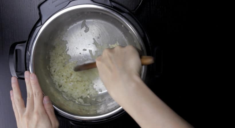 Instant Pot Turkey Breast Recipe (Pressure Cooker Turkey Breast): saute diced onion in Instant Pot Multicooker