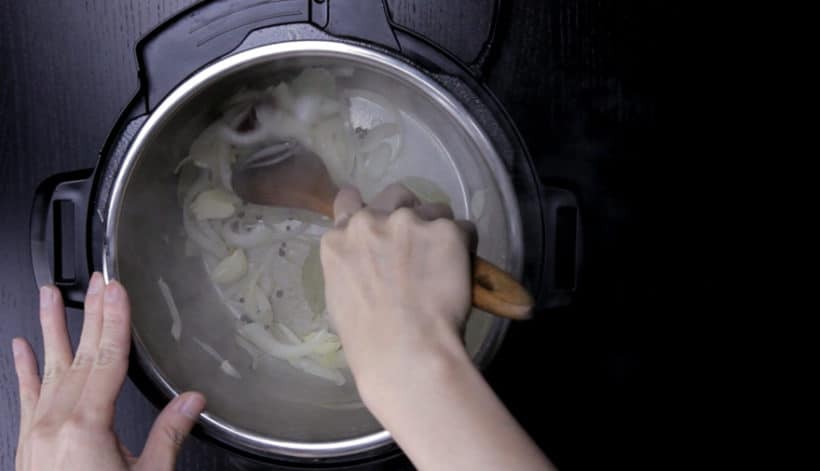 Instant Pot Chicken Adobo Recipe (Pressure Cooker Chicken Adobo): saute onions, crushed garlic, spices in Instant Pot Electric Pressure Cooker