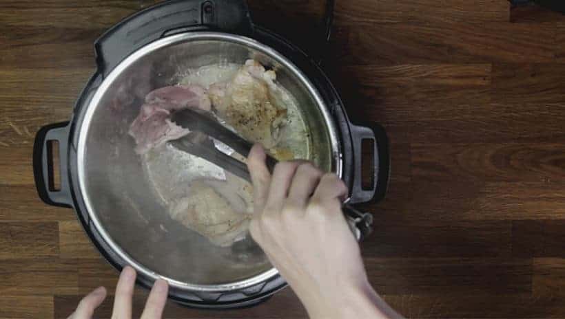 Instant Pot Gumbo Recipe (Pressure Cooker Gumbo): brown seasoned chicken thighs in Instant Pot Pressure Cooker