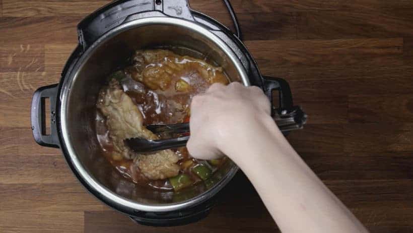 How to Make Instant Pot Sweet 'n Sour Pork Chops Recipe: adjust seasoning and coat pork chops with sweet and sour sauce