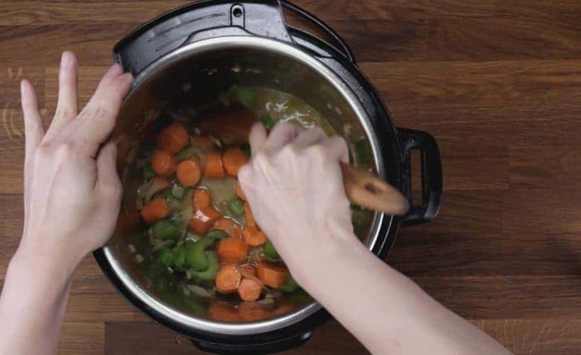 Instant Pot Chicken and Dumplings Recipe (Pressure Cooker Chicken and Dumplings): deglaze Instant Pot inner pot with wooden spoon