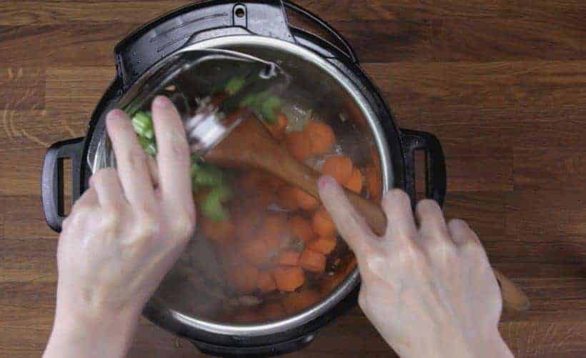 Instant Pot Chicken and Dumplings Recipe (Pressure Cooker Chicken and Dumplings): saute chopped carrots and celery in Instant Pot Pressure Cooker