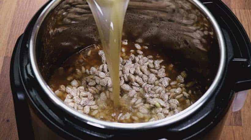 Instant Pot Refried Beans (Pressure Cooker) Recipe: add unsalted chicken stock and pinto beans in Instant Pot #instantpot
