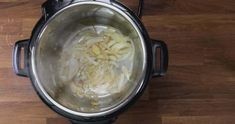 Instant Pot Pork Shoulder: saute onions in Instant Pot Pressure Cooker