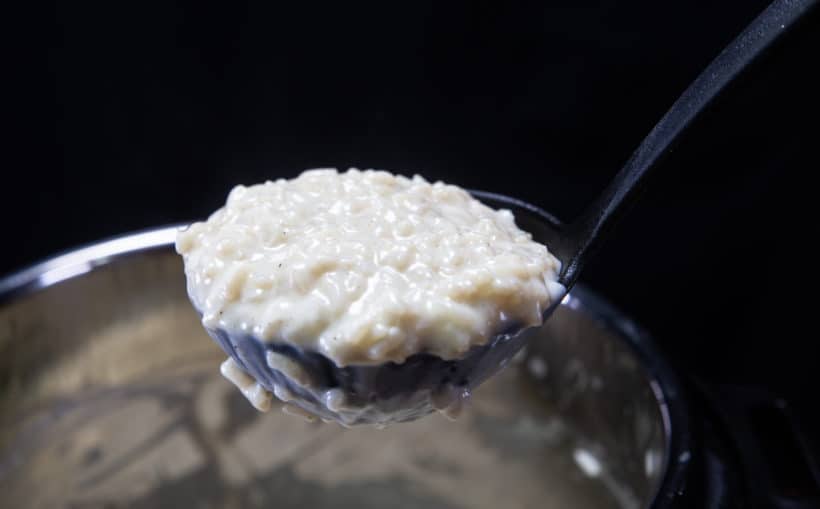Instant Pot Rice Pudding: stir and simmer rice pudding until thick, saucy, creamy, smooth