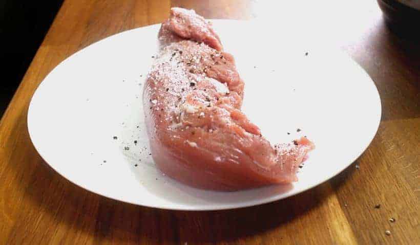 generously season pork with salt and black pepper