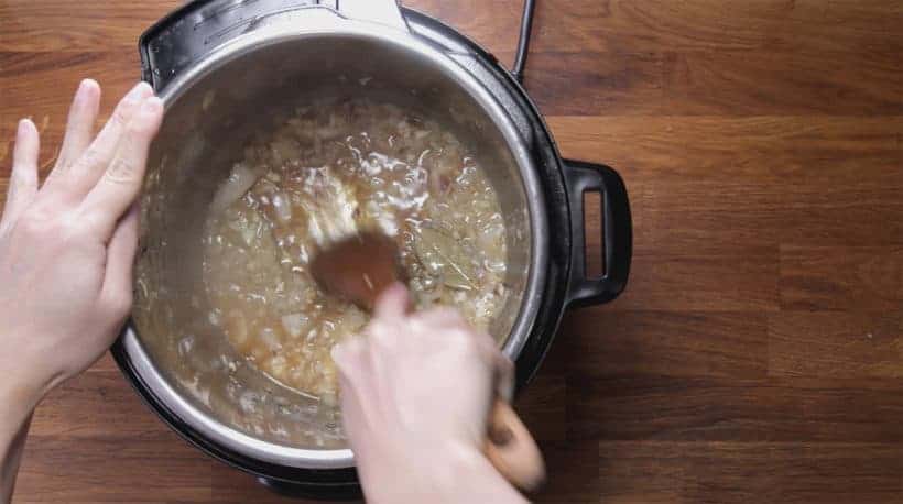 Instant Pot Potato Soup: add chicken stock and deglaze Instant Pot Pressure Cooker inner pot