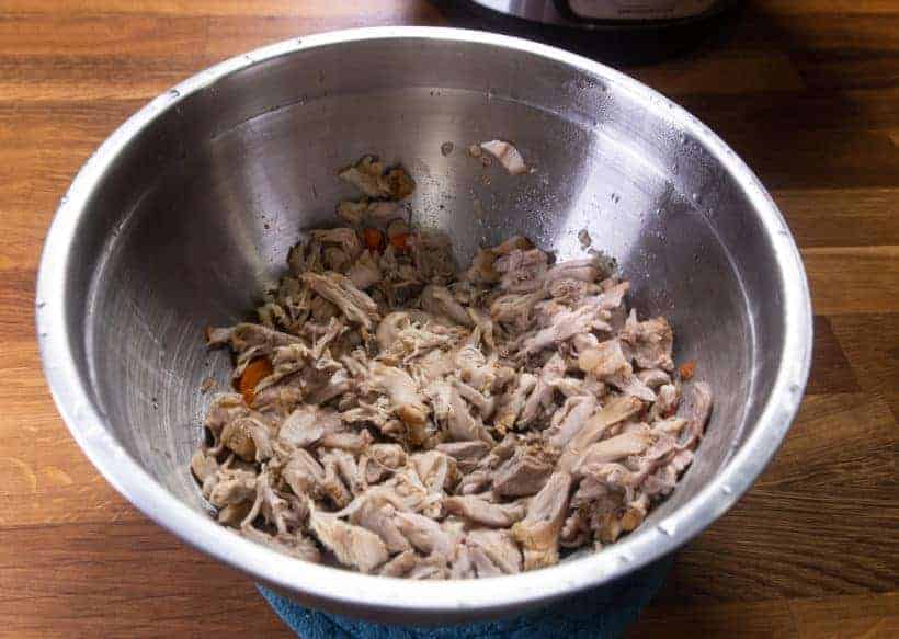 Instant Pot Chicken Soup | Pressure Cooker Chicken Soup: shred Instant Pot Chicken with forks