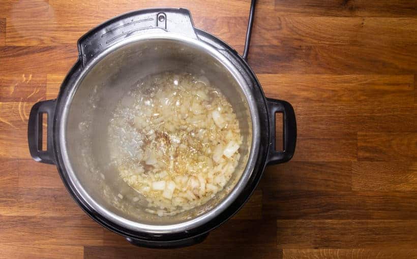 Instant Pot Chicken Soup | Pressure Cooker Chicken Soup: saute onions in Instant Pot Pressure Cooker