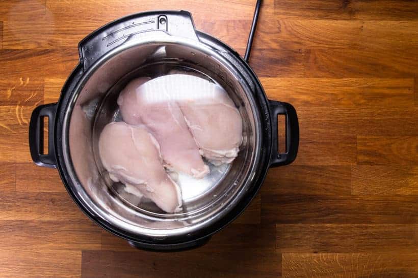 Instant Pot Shredded Chicken: pressure cook chicken breasts in Instant Pot Pressure Cooker