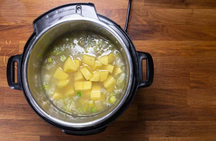 Instant Pot Potato Leek Soup | Instant Pot Potato Soup: add unsalted chicken stock, diced potatoes in Instant Pot Pressure Cooker