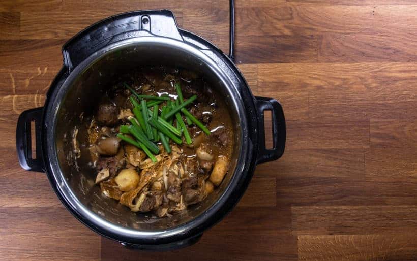 Instant Pot Chinese Lamb Stew | Pressure Cooker Lamb Stew: add green onion stalks to lamb stew in Instant Pot Pressure Cooker