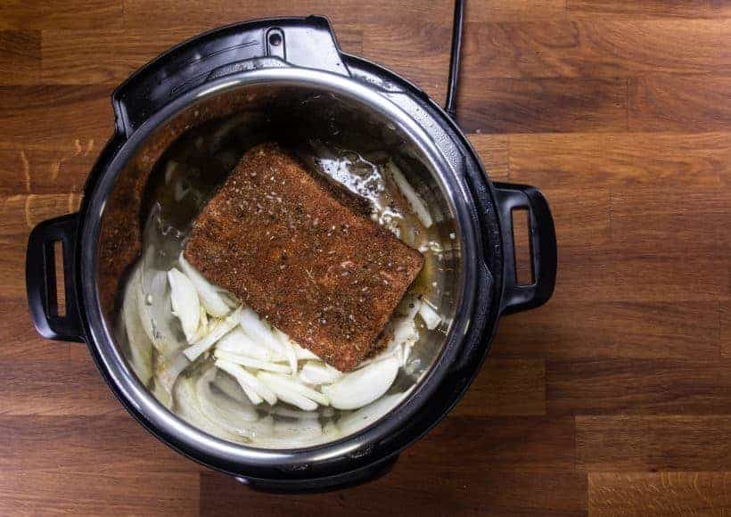 Instant Pot Brisket | Pressure Cooker Beef Brisket: place marinated brisket in Instant Pot Pressure Cooker