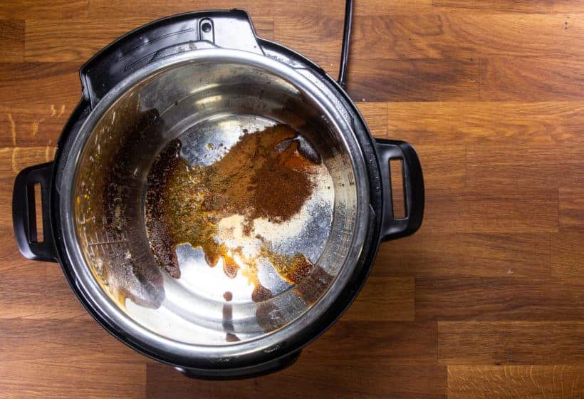Instant Pot Chicken Tacos | Pressure Cooker Chicken Tacos Recipe: add spices, aromatics in Instant Pot Pressure Cooker