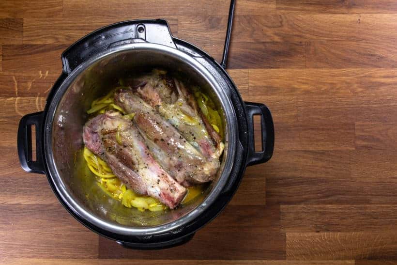 Instant Pot Lamb Shank | Pressure Cooker Lamb Shanks: add browned lamb shank in Instant Pot Pressure Cooker