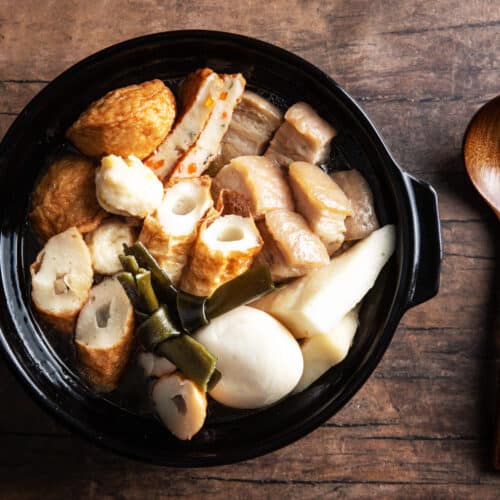 Oden japanese hot pot with fish dumplings Vector Image